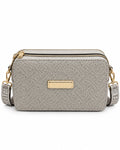 Grey boxy camera bag with embossed pattern