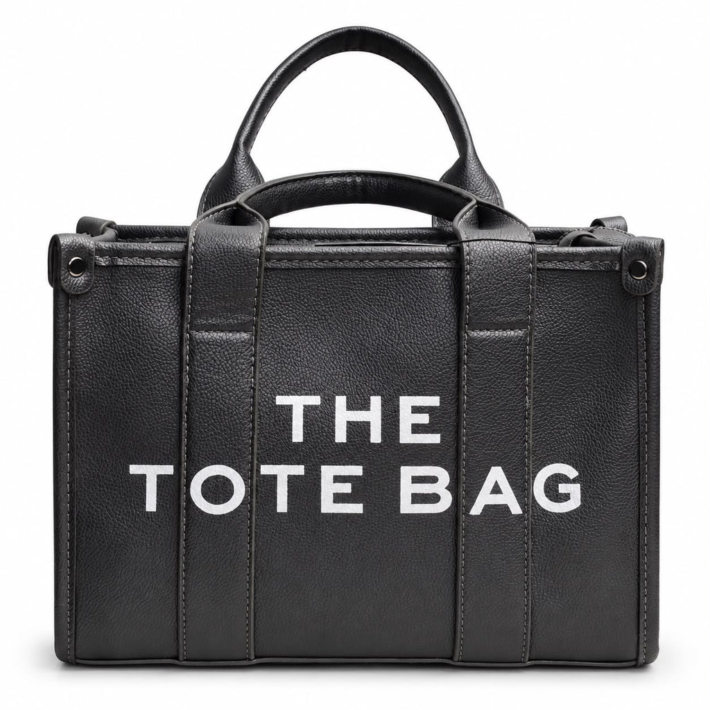 Black leather tote with graphic text print